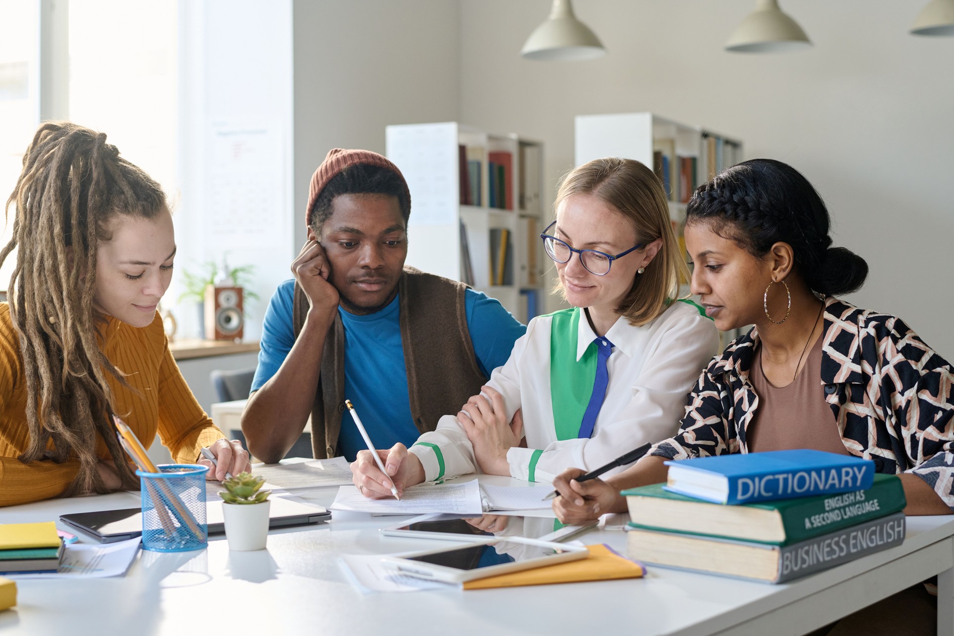 Female Teacher with Group of Students