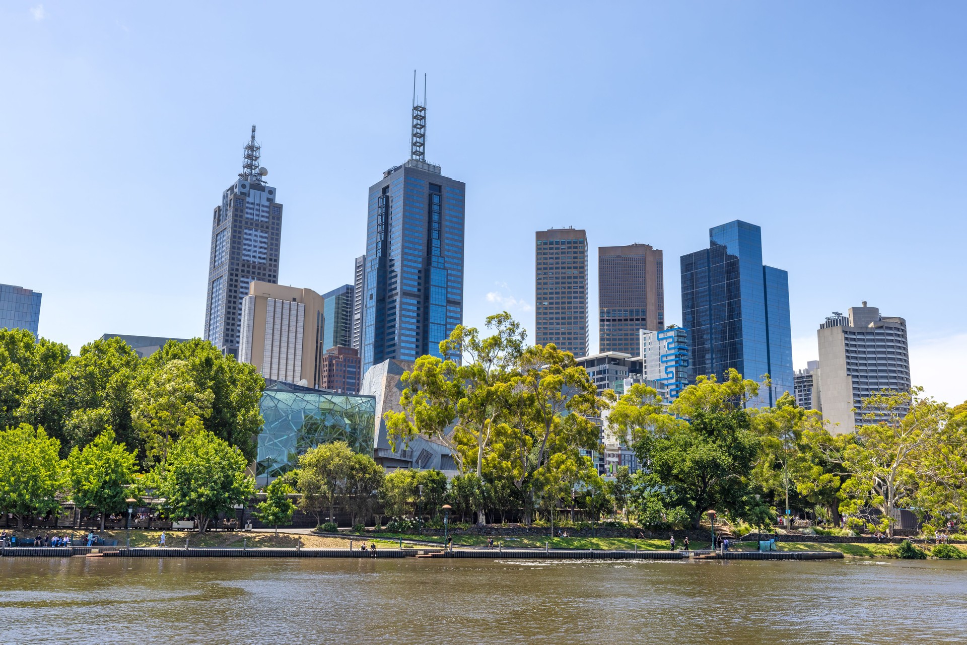 City view of downtown Melbourne with modern architecture and the Yarra river.